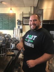 Adam Kenderdine proprietor, Benchwarmer's Coffee and Doughnuts